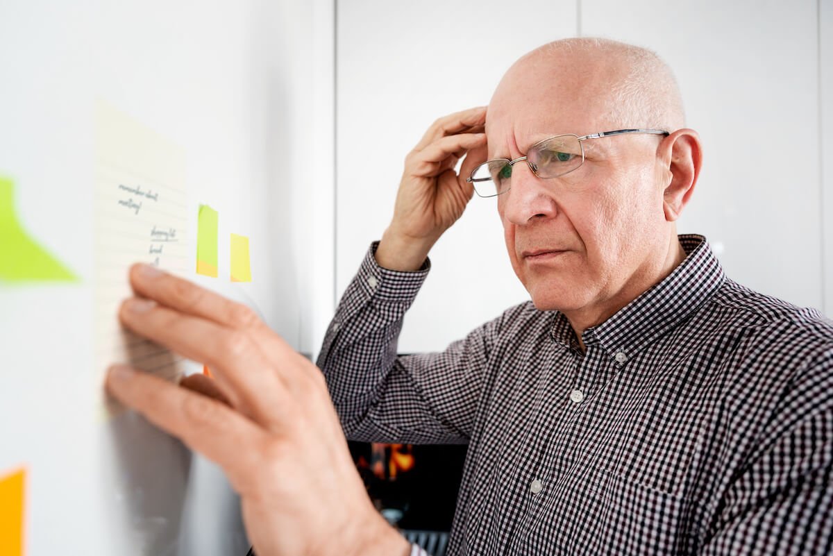 Older adult trying to remember something