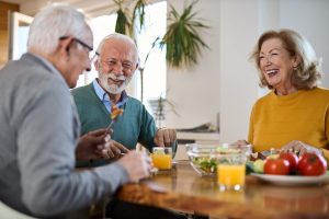 Older adults having breakfast together.