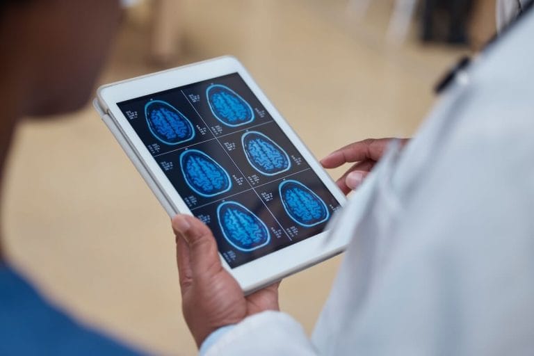 Tablet with a brain scan for an early dementia detection